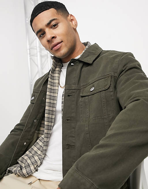 Close-up of green denim jacket for men